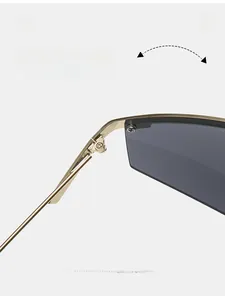 Close-up of durable golden metal hinges on semi-rimless sports cycling sunglasses