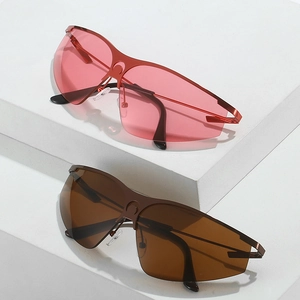 Sporty semi-rimless sunglasses in red and amber with sleek wraparound lenses