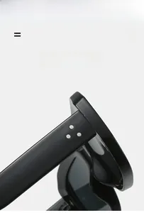 Detail of black frame sunglasses showing silver rivet accents and flexible material