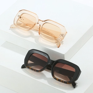 Retro thick square frame sunglasses with amber and black frames for a stylish street look