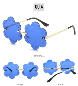 Three perspectives of rimless flower-shaped sunglasses with blue lenses and gold metal frame