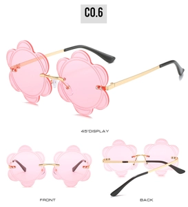 Three views of rimless flower-shaped pink sunglasses with thin gold metal frames