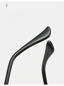 Detail of ergonomic curved mirror legs on frameless sunglasses with a matte finish
