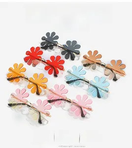 Detailed array of colorful flower-shaped rimless sunglasses with gold metal temples