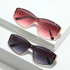Lunettes de soleil sans monture oversize avec verres dégradés et rivets en métal