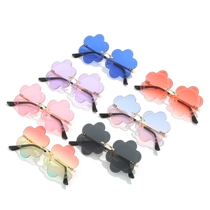 Frameless flower-shaped sunglasses collection in multiple colors with metal frame for women