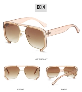 Detail view of large geometric punk sunglasses with transparent peach tan frame and CE mark