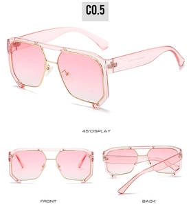 Detail view of pink gradient sunglasses with gold metal bridge and model specifications