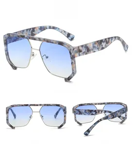 Detailed views of punk hip-hop sunglasses with marble frames and blue gradient lenses