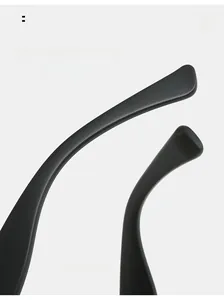 Detail of matte black curved eyeglass temples showing ergonomic design for comfortable wear
