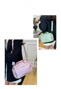 Macro detail of high-quality nylon tote bag with multi-pockets and metal zippers