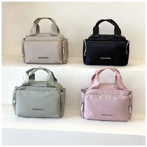 Nylon tote bags in four colors with GENTLEWOMAN logo and metal zipper details