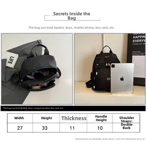 Size chart showing 27x33x11cm dimensions for the minimalist black nylon backpack