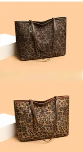 Detail of leopard print tote bag with brown leather handles and silver metal rivets