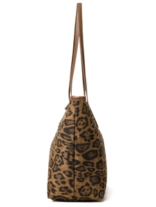 Close-up of the leopard print tote bag side stitching and premium brown leather handle