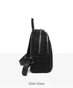 Side view of leopard print backpack showing spacious double zipper main pocket