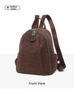 Front view of leopard print faux leather backpack with nylon straps and side pockets