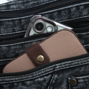 Retro washed denim crossbody bag featuring a spacious interior with multi-pocket storage