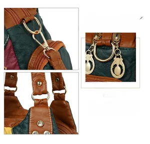 Close-up of golden hardware details and rhinestones on multi-color leather handbag