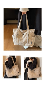 Macro detail of beige tote bag showing nylon texture and functional vertical zipper pockets
