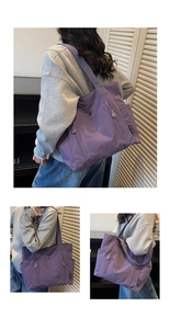 Detail view of large purple tote bag with side pockets and functional zipper compartments