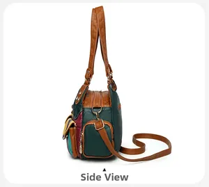 Side view of multi-color leather handbag showing thickness and metal zippers