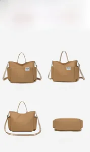 Brown nylon tote bag with multi-pockets shown in front side back and bottom views