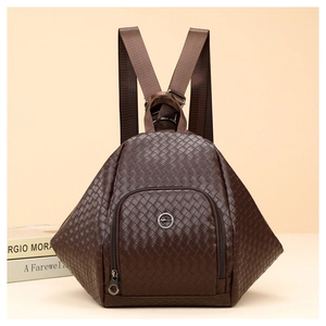 Detail of brown woven texture backpack with structured design and kangaroo metal logo