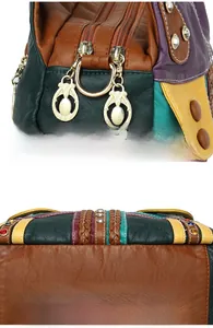Detailed macro view of vintage gold hardware zipper and precision stitching on leather tote