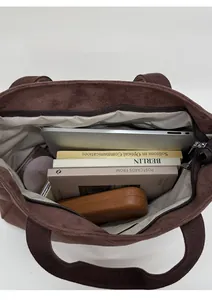 Top view showing the large interior capacity of the dark brown suede tote bag for work