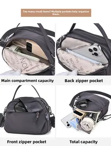 Détails des compartiments du sac en nylon montrant une grande capacité de rangement