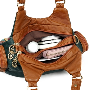 Retro multi-color patchwork leather handbag with spacious interior and gold hardware