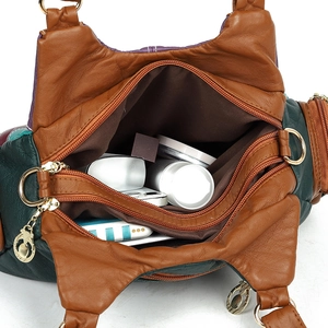 Contrast color patchwork leather tote with large capacity and multi-zipper compartments