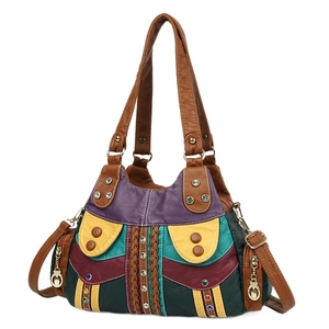 Multicolor patchwork leather tote bag with crystal accents and woven leather details