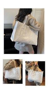 Detailed views of a white waterproof Tyvek tote bag with 3D embossed TOTE BAG lettering