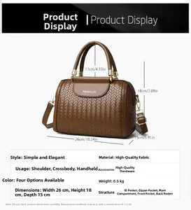 Detailed size specifications for the brown woven Boston handbag with dimensions shown