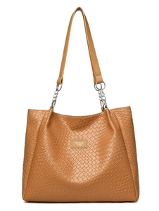 Close-up of tan woven texture tote bag with silver chain straps and brand name tag