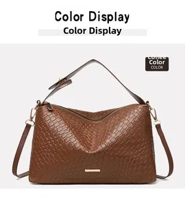 Detailed close-up of coffee brown woven texture shoulder bag with gold metal logo plaque