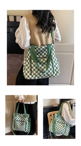 Detail of green and white checkerboard tote bag showing knit texture and shoulder strap