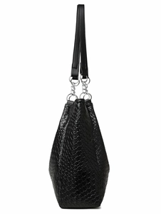 Detailed close-up of woven black leather texture and silver ring metal hardware on tote bag