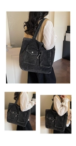 Detail of washed black denim tote bag showing vintage texture and utility cargo pockets