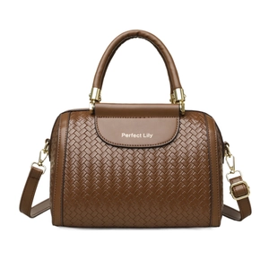 Brown woven Boston style handbag with top handle and crossbody strap on white background