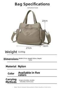 Khaki nylon handbag 27x20x12cm with adjustable straps and multi-pocket design detail