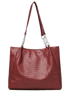 Detail of the dark burgundy woven PU leather tote bag with silver chain straps