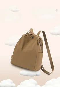 Detail of a lightweight 0.395kg khaki nylon backpack with 3D cloud scene decoration
