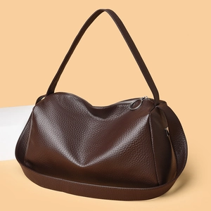 Minimalist large brown leather shoulder bag with lychee texture and silver zipper detail
