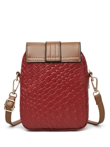 Detail of dark red woven crossbody phone bag with brown flap and golden metal hooks
