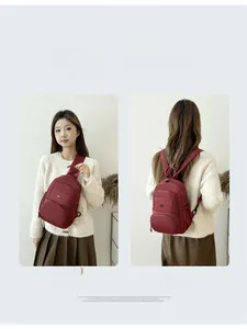 Versatile burgundy travel backpack showing dual shoulder and crossbody carry modes