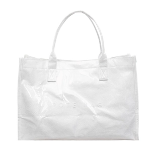 Minimalist white DuPont paper tote bag with TOTE BAG embossing and modern dual handles