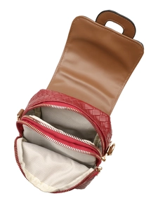 Detail view of red woven shoulder bag with multiple zippered compartments and herringbone lining
